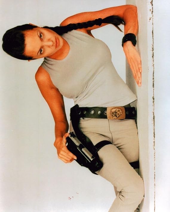 Angelina Jolie Laying In Tomb Raider Gear Photo Print (8 x 10) - Item # PIC00352