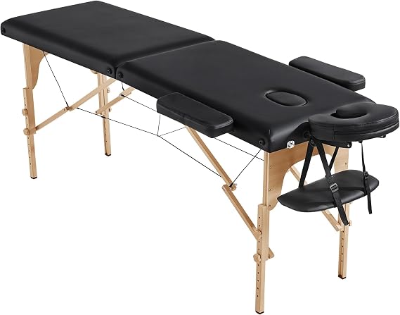 Yaheetech Portable Folding Massage Table, Height-Adjustable Lash Bed, Black | Padded PVC leather on a sturdy wood frame, this folding tattoo and spa table sets up fast and folds flat with a carry handle