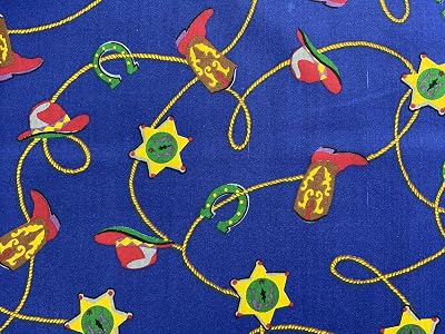 56” Wide Cotton Boots Badges Horseshoe Lasso Blue Background